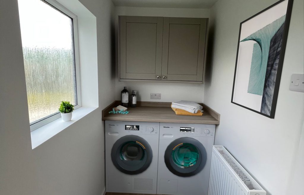 A much needed utility room, part of the renovation of a single-story, dark brick detached bungalow on Waveney Grove